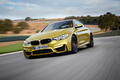 BMW M4 2014 - jaune - 3/4 avant gauche dynamique