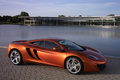 McLaren MP4-12C - orange - 3/4 avant droit