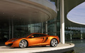 McLaren MP4-12C - orange - 3/4 avant gauche