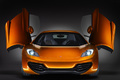 McLaren MP4-12C - orange - face avant, portes ouvertes