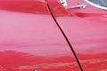 Lamborghini Miura SV rouge logo Bertone debout