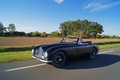 Aston Martin DB2 Cabriolet vert foncé 3/4 avant gauche travelling