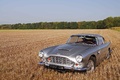 Aston Martin DB4 gris 3/4 avant gauche 