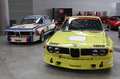 BMW 3.0 CSL blanche et jaune Retroclassics 2009 3/4 avant gauche et profil