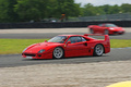 Ferrari F40 rouge Sport & Collection 2009 3/4 avant gauche filé
