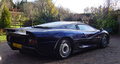 Jaguar XJ220 bleue 3/4 arrière droit