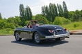 Jaguar XK150 Roadster noir 3/4 arrière gauche traveling