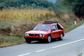 Lancia Delta S4 Rouge 3/4 avant gauche dynamique