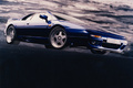 Lotus Esprit S4s bleu 3/4 avant droit penché