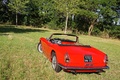 Maserati 3500 GT Spyder rouge 3/4 arrière gauche penché