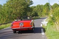 Maserati 3500 GT Spyder rouge face arrière travelling penché