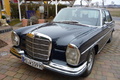 Mercedes 300 SEL 6.3 noir 3/4 avant gauche