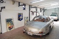 Mercedes 300 SL gris 3/4 arrière droit porte ouverte atelier CSL