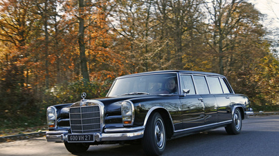 Mercedes 600 LWB noir 3/4 avant gauche travelling