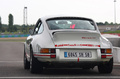 Porsche 911 Carrera RS 2.7 blanche/rouge Classic Days 2008 face arrière