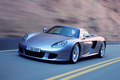 Porsche Carrera GT grise 3/4 avant gauche travelling