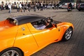 Tesla Roadster Sport orange 3/4 arrière droit filé coupé