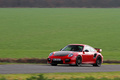 Porsche 997 GT2 RS rouge 3/4 avant gauche filé