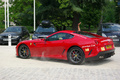 Ferrari 599 GTO rouge 3/4 arrière gauche filé