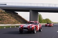 AC Cobra rouge & Ford GT40 3/4 avant gauche travelling