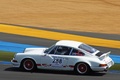 Posche 911 Carrera 2.7 RS blanc/rouge 3/4 arrière gauche filé vue de haut