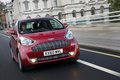 Aston Martin Cygnet bordeaux 3/4 avant droit travelling penché 2