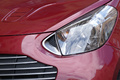 Aston Martin Cygnet bordeaux phare avant