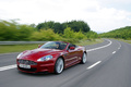 Aston Martin DBS Volante rouge 3/4 avant gauche travelling 2