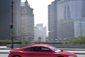 Audi e-Tron rouge profil debout