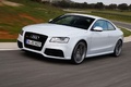 Audi RS5 blanc 3/4 avant gauche travelling penché 3