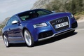 Audi RS5 bleu 3/4 avant droit travelling penché 2