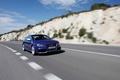 Audi RS5 bleu 3/4 avant droit travelling penché 3