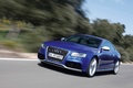 Audi RS5 bleu 3/4 avant gauche travelling penché 3
