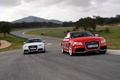 Audi RS5 rouge 3/4 avant droit & blanc face avant travelling penché 2