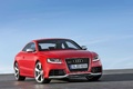 Audi RS5 rouge 3/4 avant droit penché 3