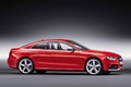 Audi RS5 rouge 3/4 avant droit