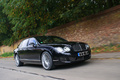 Bentley Continental Flying Spur Speed noir 3/4 avant droit travelling penché