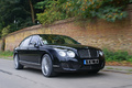 Bentley Continental Flying Spur Speed noir 3/4 avant droit travelling