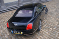 Bentley Continental Flying Spur Speed noir château 3/4 arrière droit vue de haut penché