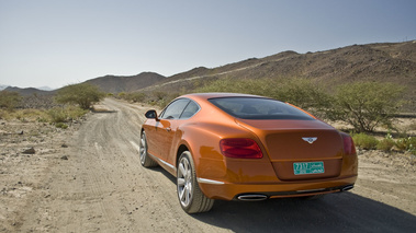 Bentley Continental GT orange 3/4 arrière gauche