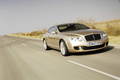 Bentley Continental GT Speed beige 3/4 avant droit travelling penché 2
