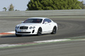 Bentley Continental Supersports blanc 3/4 avant gauche filé 4