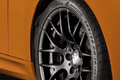 BMW M3 GTS - orange - détail, roue + aile