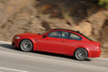 BMW M3 rouge filé penché