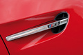 BMW M3 rouge répétiteur