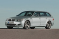 BMW M5 Touring gris 3/4 avant gauche