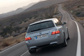 BMW M5 Touring gris face arrière travelling penché