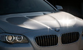 BMW Série 5 2010 - grise - capot, calandre, phares
