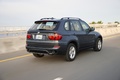 BMW X5 2010 gris 3/4 arrière