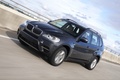 BMW X5 2010 gris 3/4 avant 2